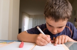 young student working on homework